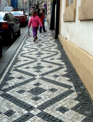 Rita was afraid to walk on the black and white tiles in front of a women's center in the city.