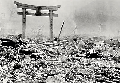 Hiroshima after the atomic bomb. All that is left is the entrance to a temple and the remains of a cart.