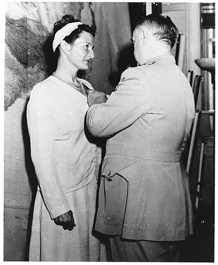 Virginia Hall receiving the Distinguished Service Cross from Gen. William "Wild Bill" Donovan. She was the only civilian woman to receive this honor.