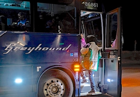 Ricardo Chub-Bo, 40, and his daughter Rosa Maria, 14, from Poptun in El Petun department, Guatemala, board the Greyhound bus they will take to Albuquerqe before their three-day journey through the United States to Philadelphia on January 3, 2019 in Dona Ana, New Mexico. - They spent eight days in migration detention and were released with a group of about 20 Central American migrants to the Basilica of San Albino in Mesilla, New Mexico, which provided them hospitality the night of their release. Ricardo relies on his daughter to help read letters and numbers, while she relies on him to communicate in Spanish, as she still isnt used to speaking it. The two speak to each other in their mother tongue of K'iche', a Maya language spoken in the central highlands of Guatemala. The church had provided them with a piece of paper that asks for help finding the connection in English and a phone number to call if they need help. For them, luckily, they ran into another group of Guatemalans going on the same bus, which they could team up with in case they had trouble. (Photo by Paul Ratje / AFP) (Photo credit should read PAUL RATJE/AFP via Getty Images)