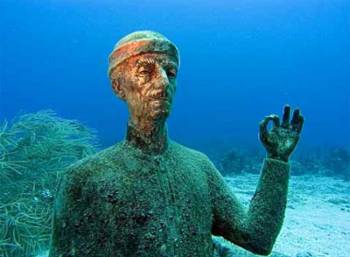 Before Ivan and Ivana leave Guadeloupe, they visit the Jacques Cousteau Marine Reservewhere they see this underwater statue of Cousteau