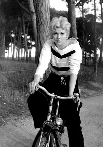 Kim Novak with her Puch moped.