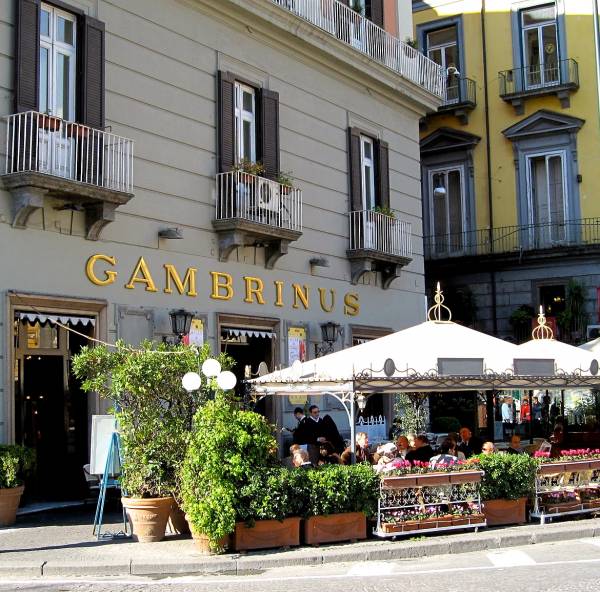 The Caffe Gambrinus , a fixture in this series, is a place for meetings and for relaxing quietly alone. Enrica's father goes there to read an important letter. Photo by Armando Mancini.