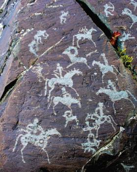 Petroglyphs in Mongolia. These, from, 1000 B.C., show the use of horses for hunting. Earlier petroglyphs here date to 11,000 B.C.