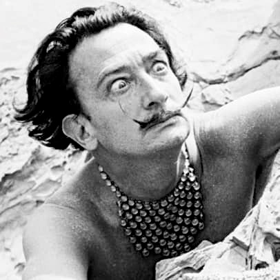 Salvador Dali, a surrealist who likes some of the work of Suzanne/Marcel.