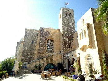 Ancient St. Andrews, now a Scottish guesthouse in Jerusalem, to which one of the women is invited by her lover.