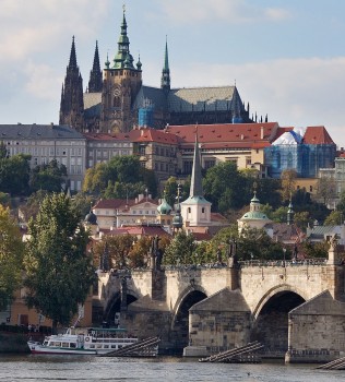 The Castle, built in the 14th century, is the seat of Czech government. The Charles Bridge, built at the same time served as the only connection between the castle and its adjacent settlements.